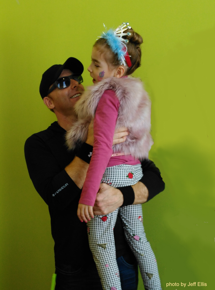 Patrick holding daughter Kennedy